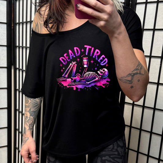 black slouchy shirt with the text "Dead Tired" on it