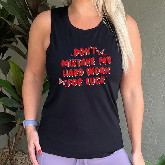 black muscle tank with the text "Don't Mistake My Hard Work For Luck" on it