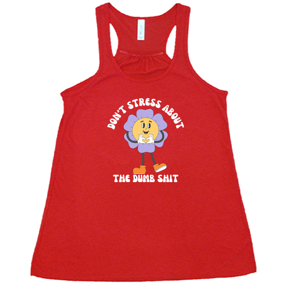 red shirt with the text "Don't Stress About The Dumb Shit" on it