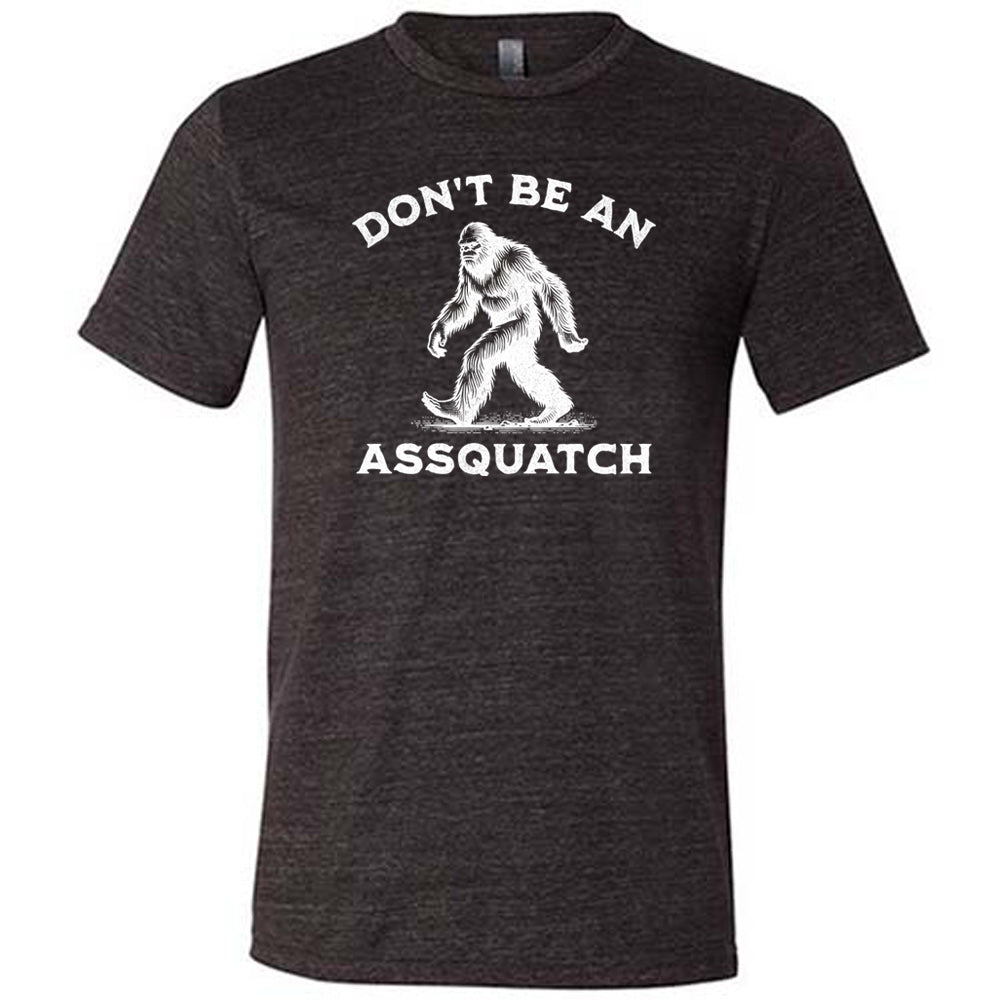 black shirt with the text "Don't Be An Assquatch" on it