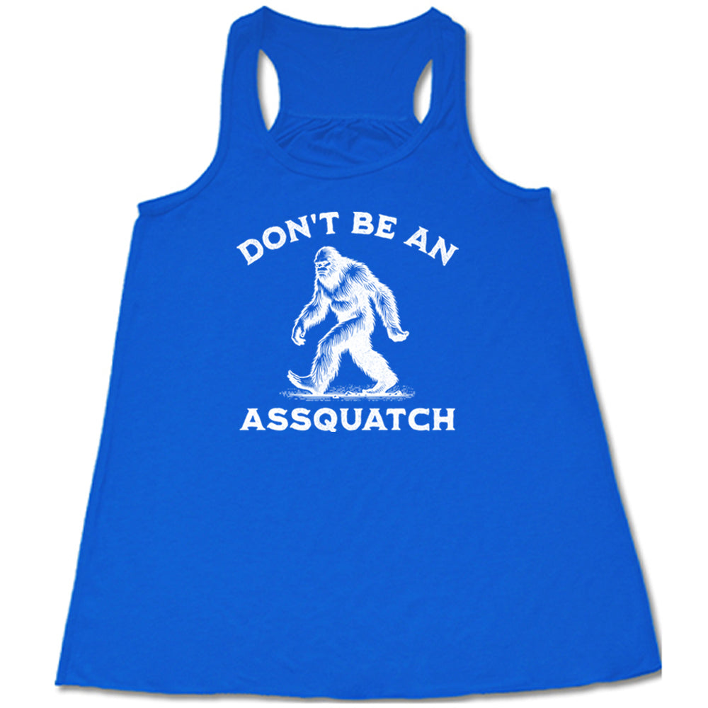 blue shirt with the text "Don't Be An Assquatch" on it