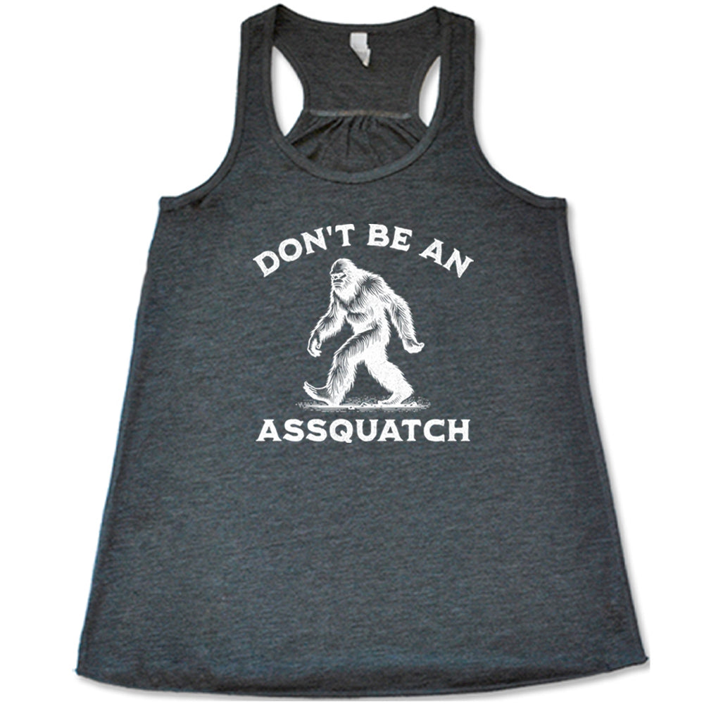 grey shirt with the text "Don't Be An Assquatch" on it