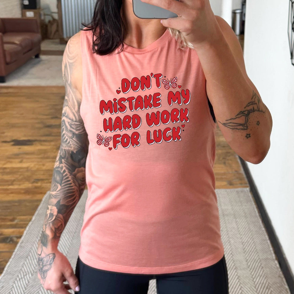 coral muscle tank with the text "Don't Mistake My Hard Work For Luck" on it