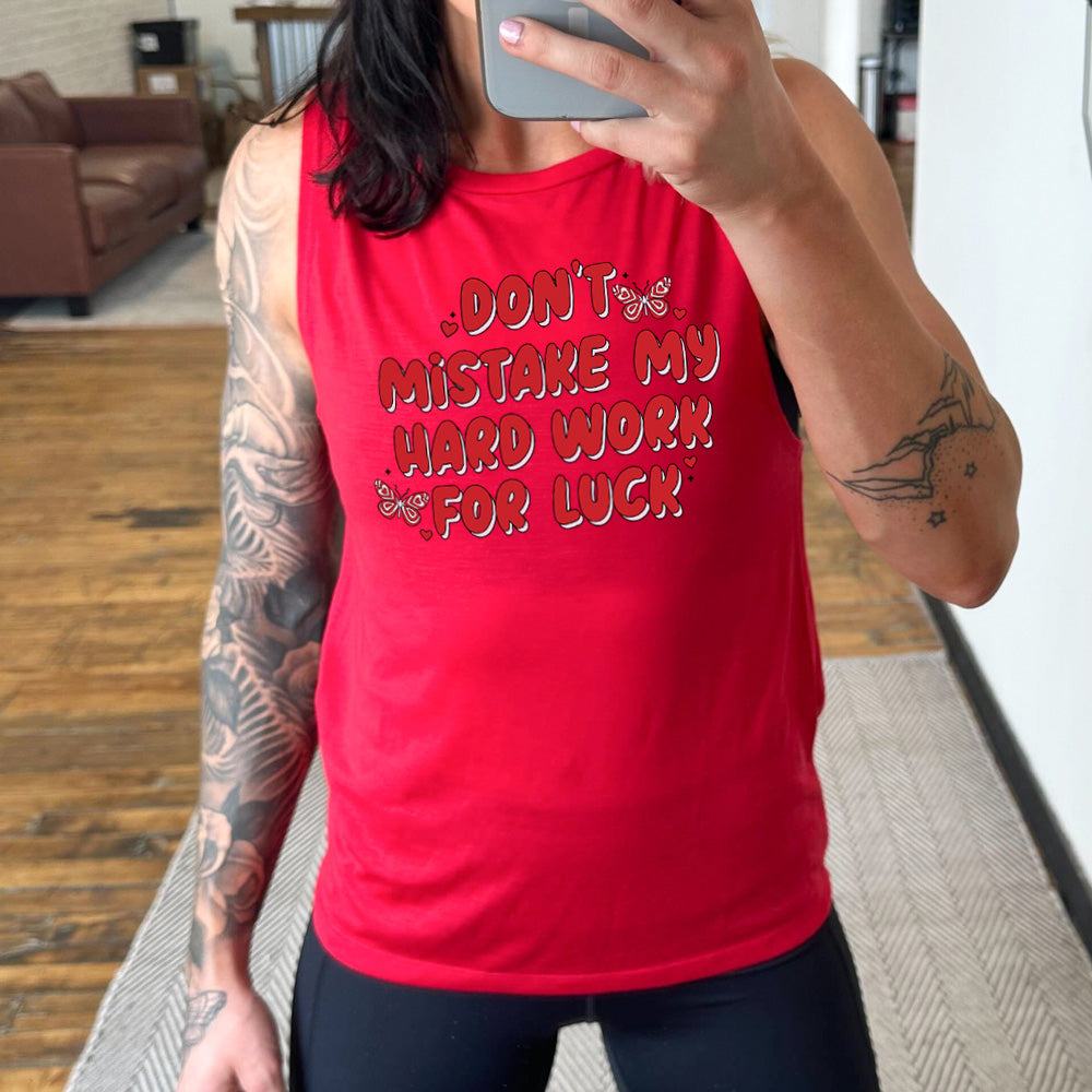 red muscle tank with the text "Don't Mistake My Hard Work For Luck" on it