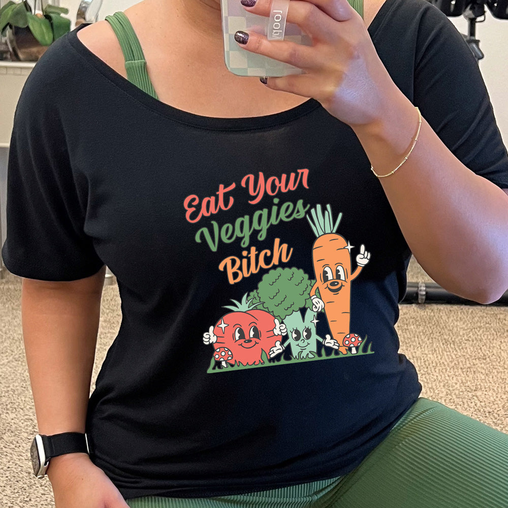 black slouchy shirt with the text "Eat Your Veggies Bitch" on it