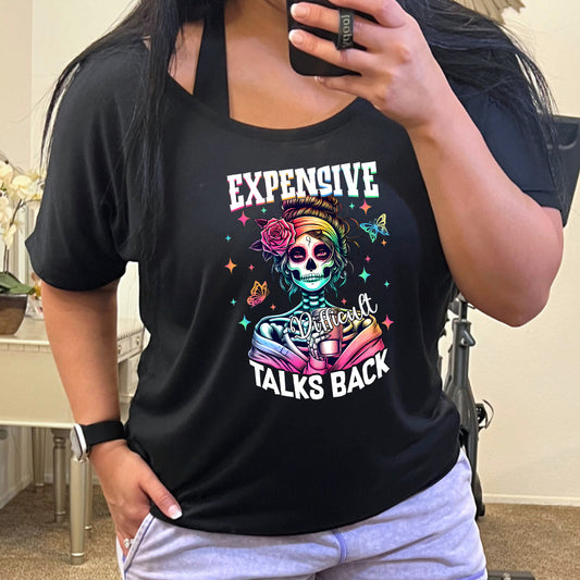 model wearing the black slouchy tee with the saying "Expensive Difficult Talks Back" on it