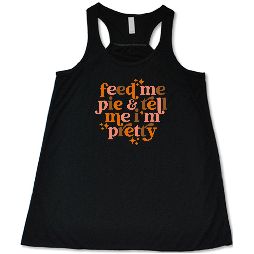 black shirt with the text "Feed Me Pie & Tell Me I'm Pretty" on it