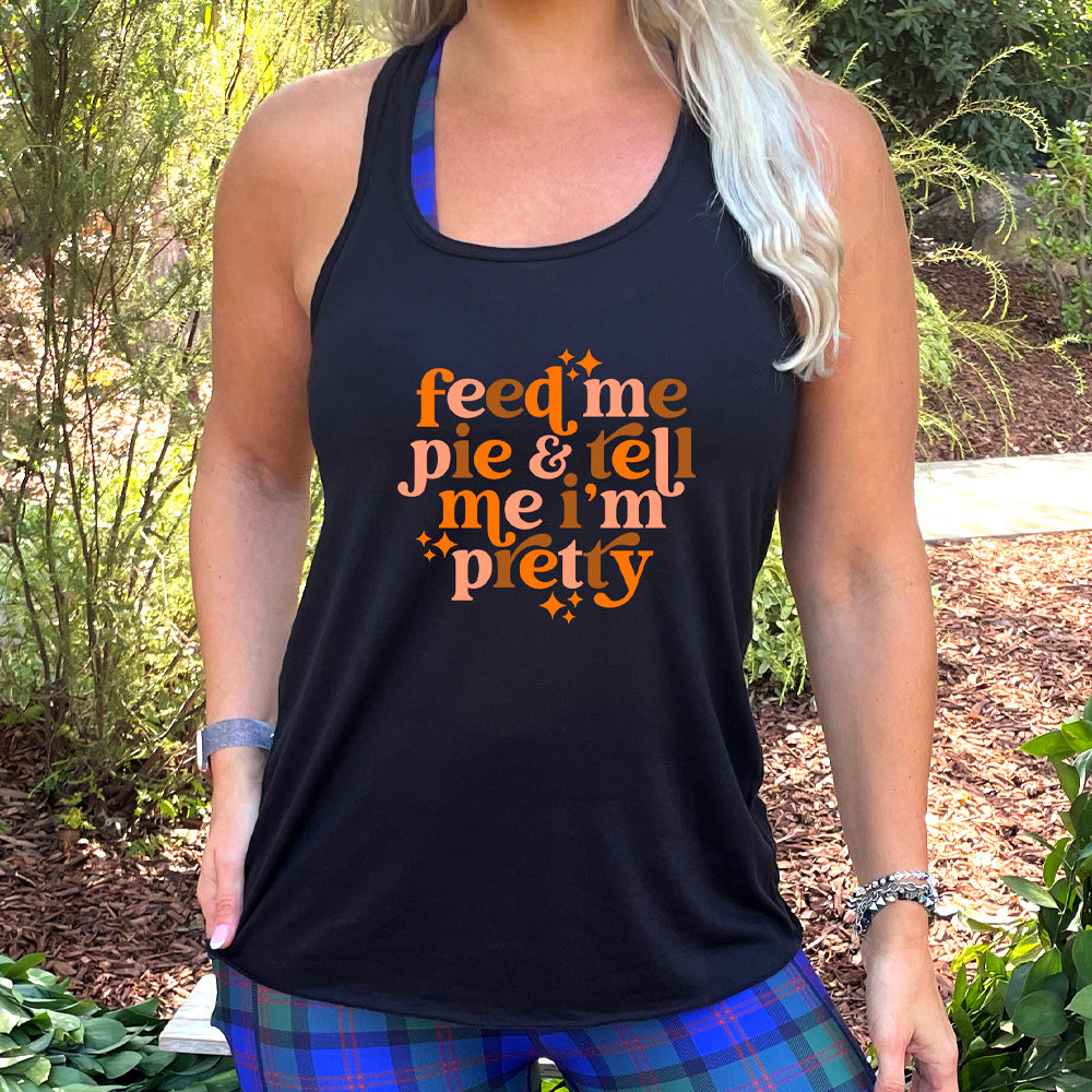 black shirt with the text "Feed Me Pie & Tell Me I'm Pretty" on it