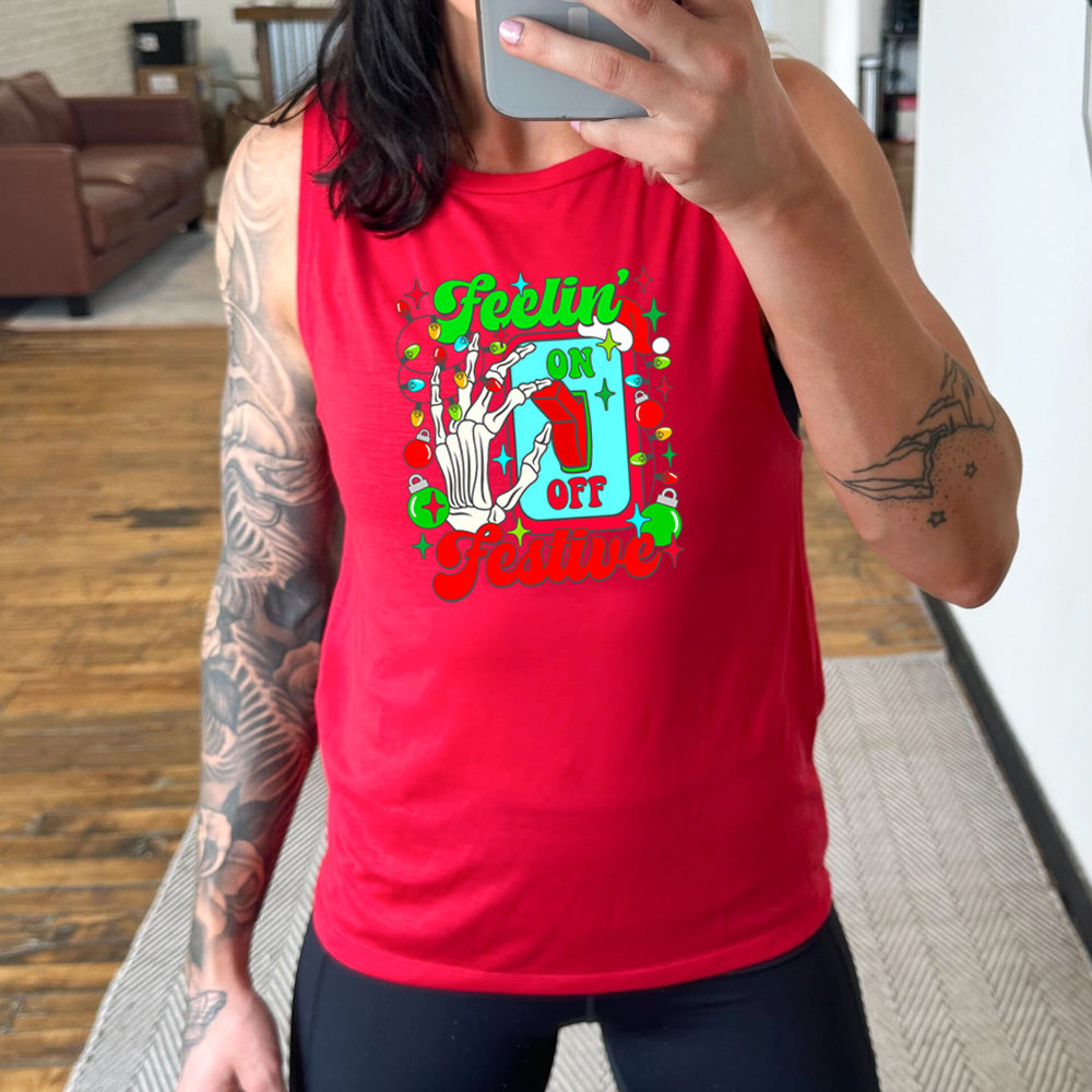 red muscle tank with the text "Feelin' Festive" on it