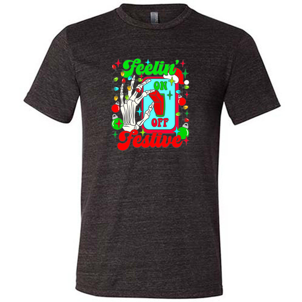 black shirt with the text "Feelin' Festive" on it