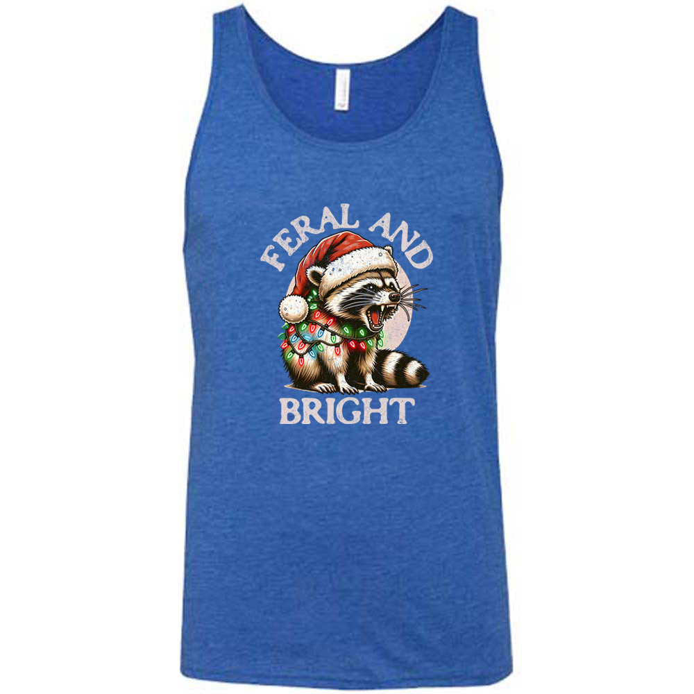 blue shirt with the text "Feral And Bright" with a raccoon graphic on it