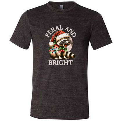 black shirt with the text "Feral And Bright" with a raccoon graphic on it