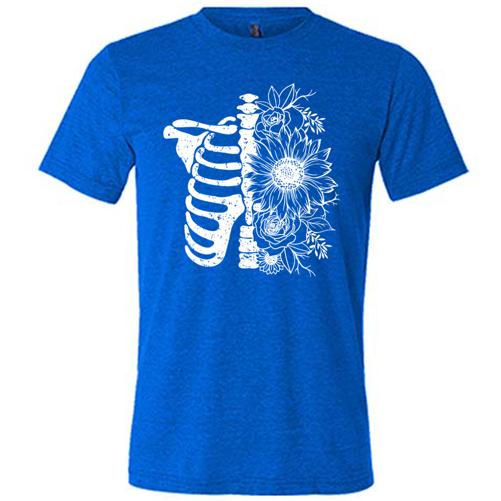 blue shirt with a white Floral Ribcage graphic on it