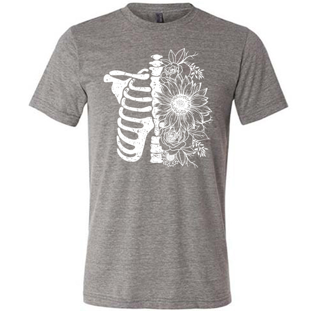 grey shirt with a white Floral Ribcage graphic on it