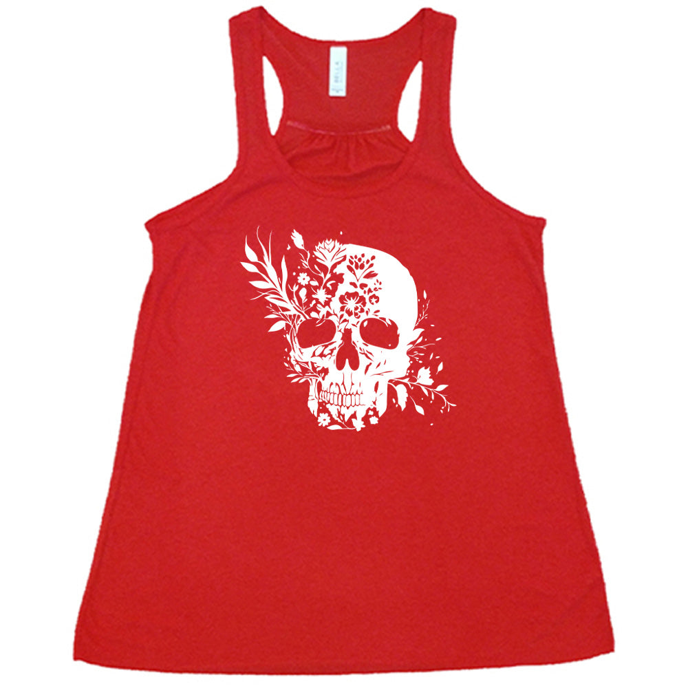 red shirt with a white Floral Ribcage graphic on it