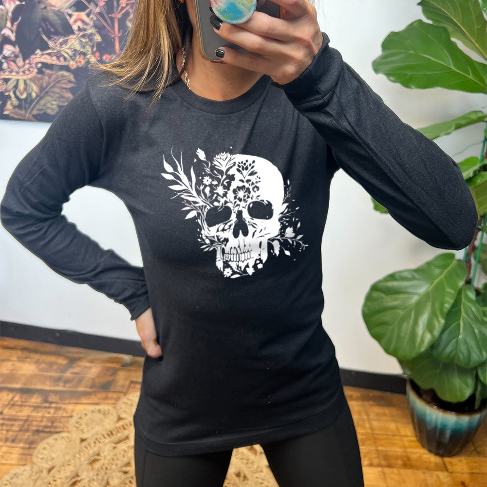 black long sleeve shirt with a white Floral Ribcage graphic on it