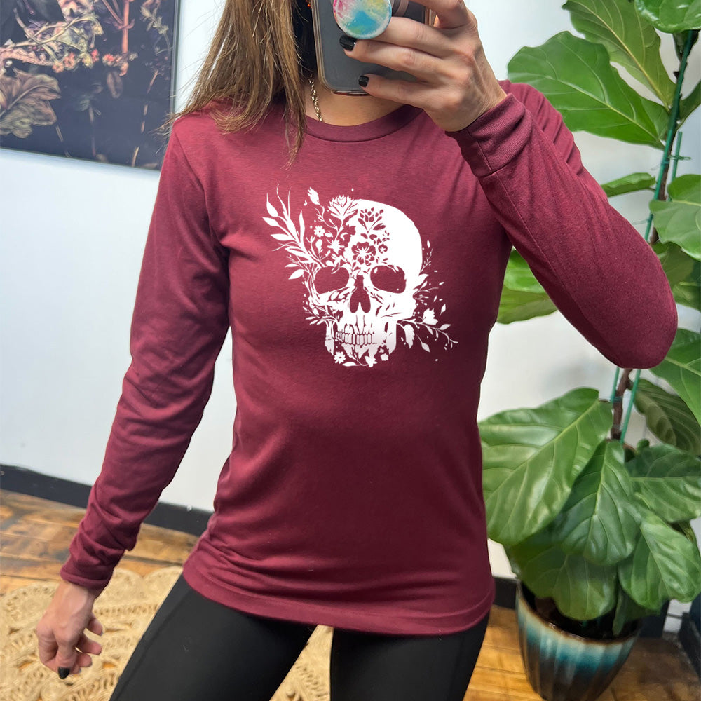 maroon long sleeve shirt with a white Floral Ribcage graphic on it