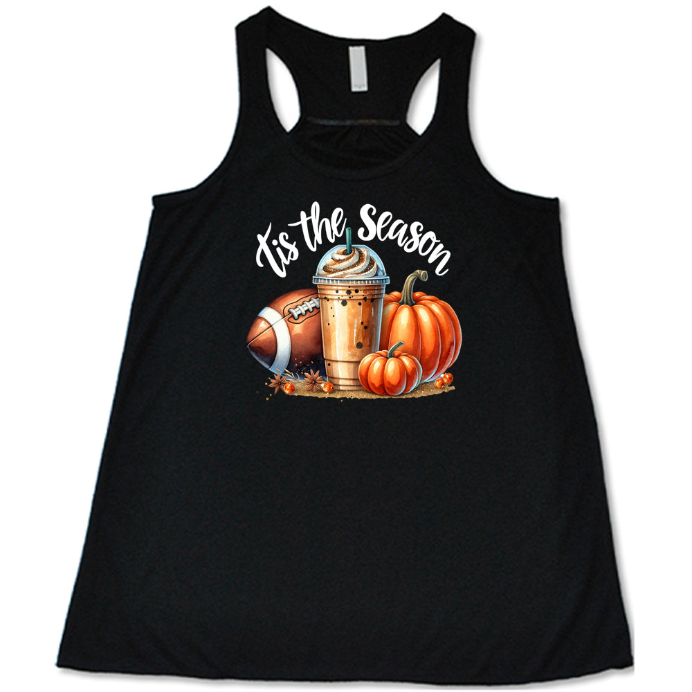 black shirt with a football, coffee and pumpkin graphic on it with the quote "tis the season" on it