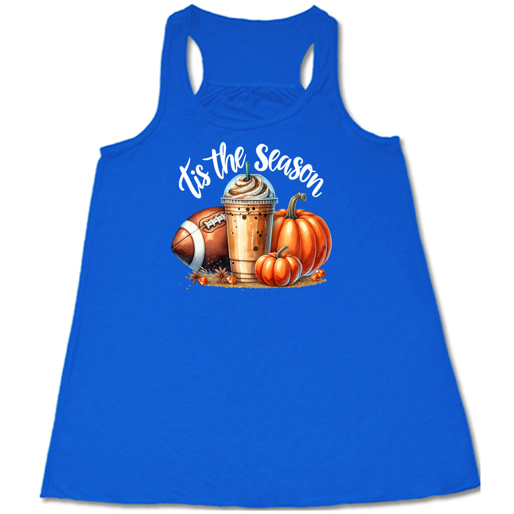 blue shirt with a football, coffee and pumpkin graphic on it with the quote "tis the season" on it