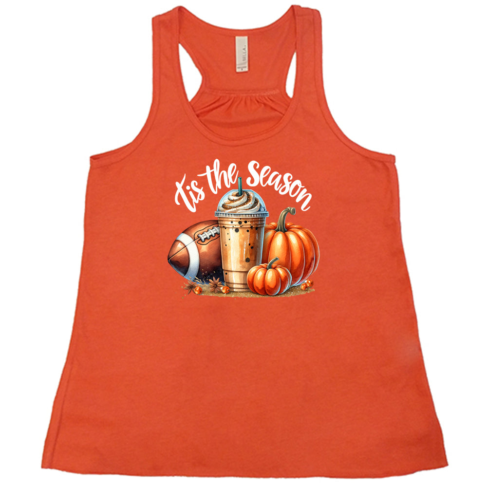 coral shirt with a football, coffee and pumpkin graphic on it with the quote "tis the season" on it