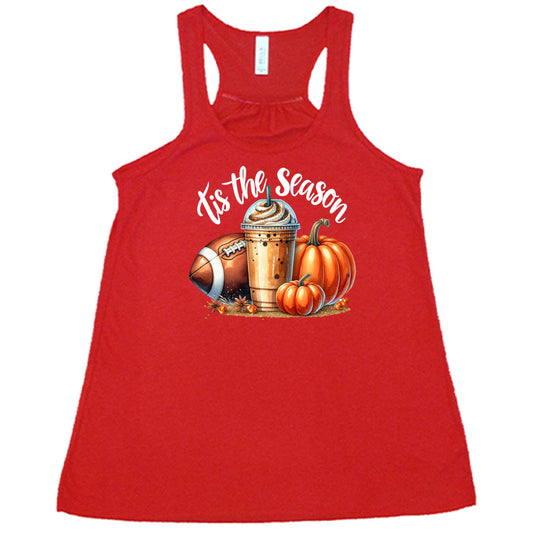 red shirt with a football, coffee and pumpkin graphic on it with the quote "tis the season" on it