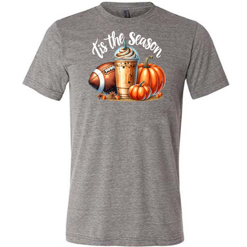 grey shirt with a football, coffee and pumpkin graphic on it with the quote "tis the season" on it