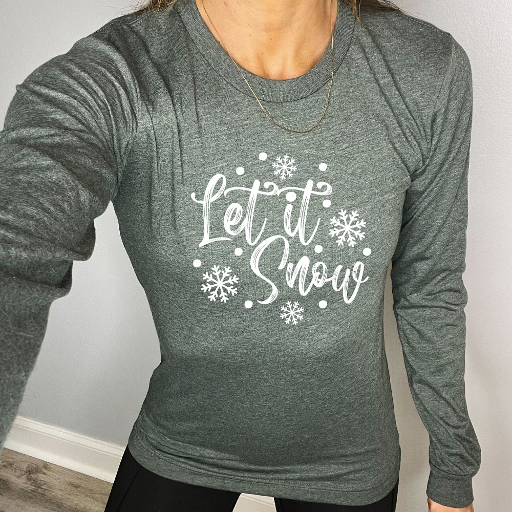 green long sleeve shirt with the text "Let It Snow" on it