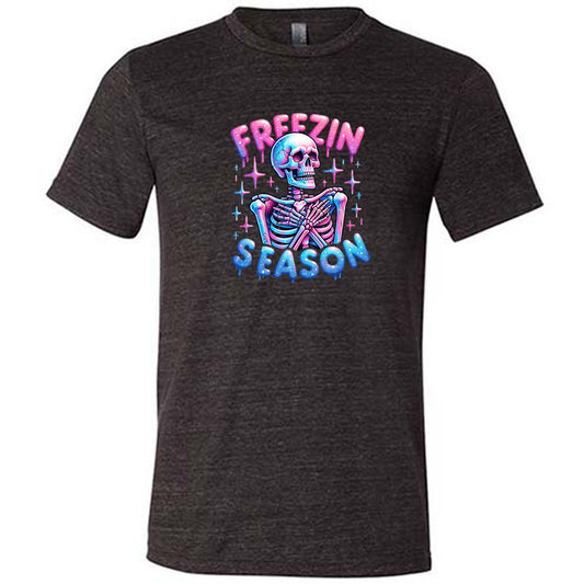 black shirt with the text "freezin season" with a graphic of a skeleton on it