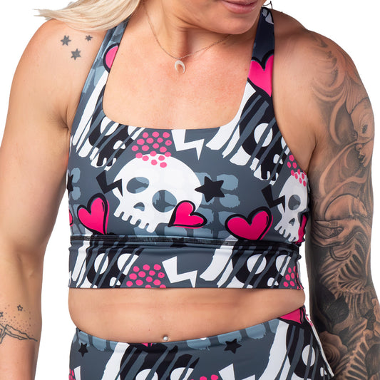 skull and heart patterned sports bra