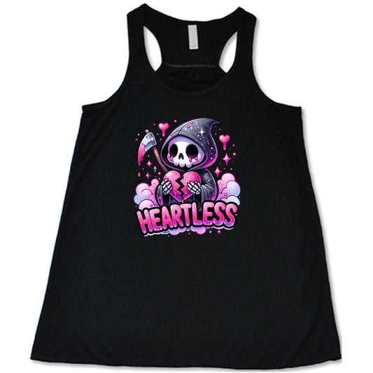 black shirt with the text "Heartless" on it