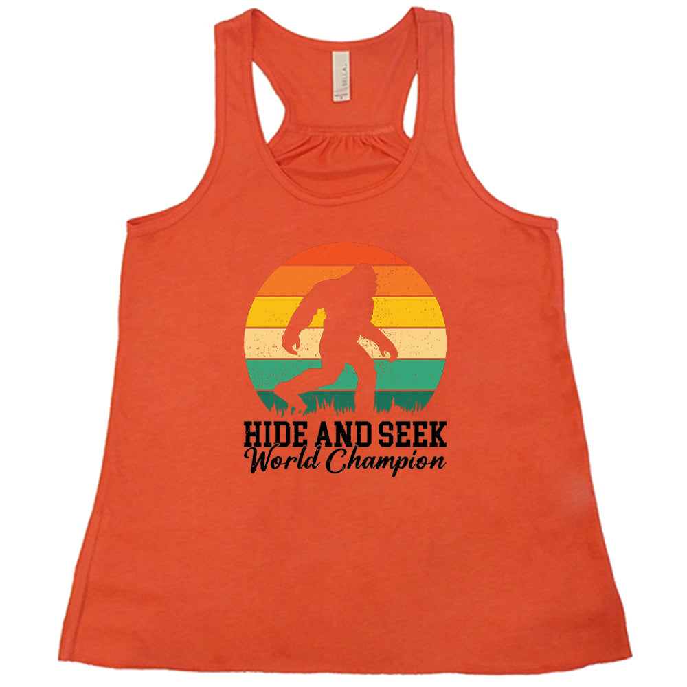 coral shirt with the text "Hide And Seek World Champion" on it