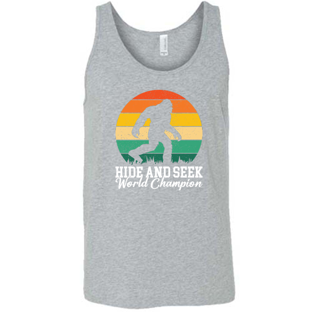 grey shirt with the text "Hide And Seek World Champion" on it