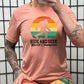 peach shirt with the text "Hide And Seek World Champion" on it