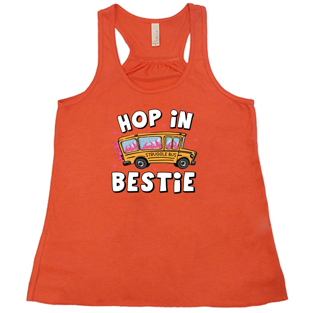 coral shirt with the text "Hop In Bestie" on it