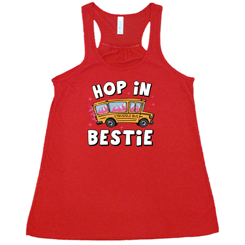 red shirt with the text "Hop In Bestie" on it