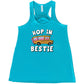 teal shirt with the text "Hop In Bestie" on it