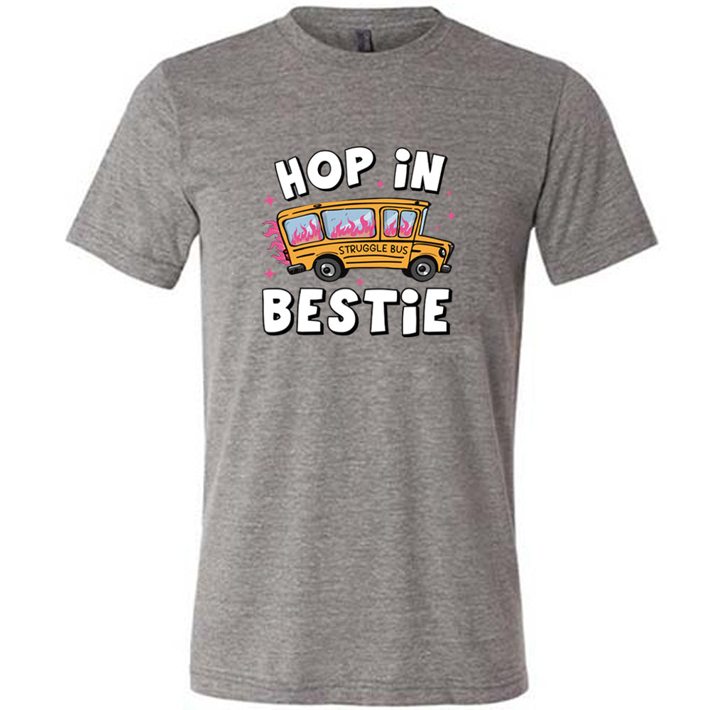 grey shirt with the text "Hop In Bestie" on it