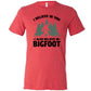 red shirt with the text "I Believe In You I Also Believe In Bigfoot" on it