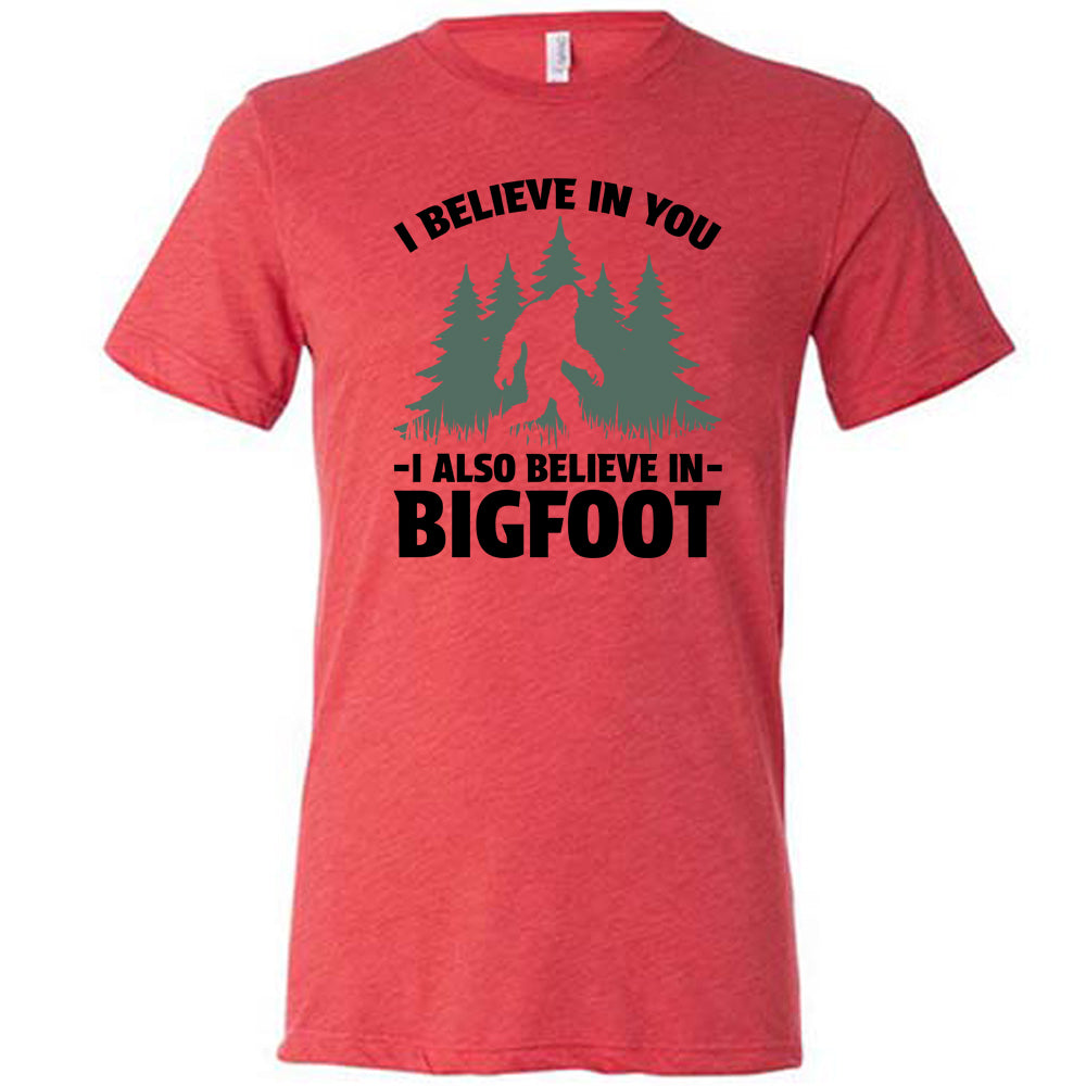 red shirt with the text "I Believe In You I Also Believe In Bigfoot" on it