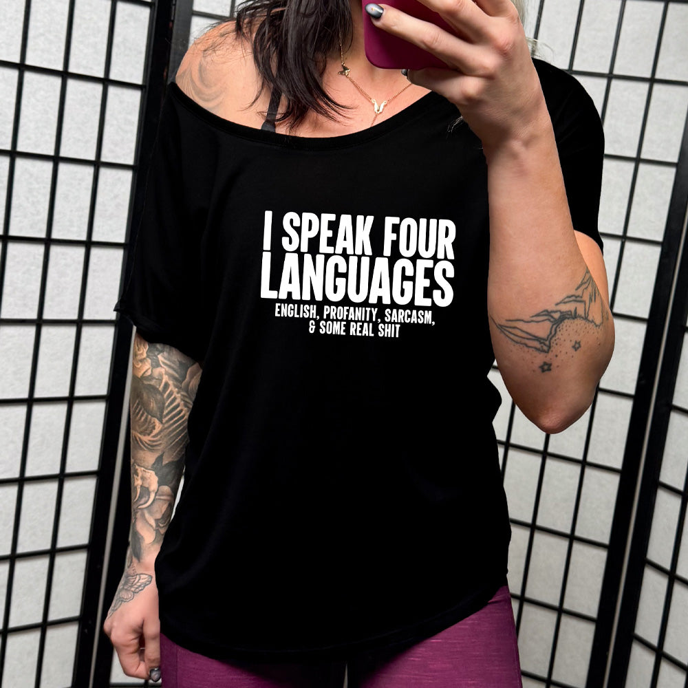 black slouchy shirt with the text "I Speak 4 Languages" on it