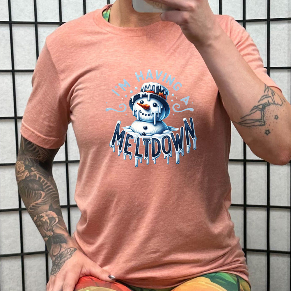 peach shirt with the text "I'm Having A Meltdown" on it