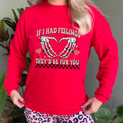 red crewneck with the text "If I Had Feelings They'd Be For You" on it