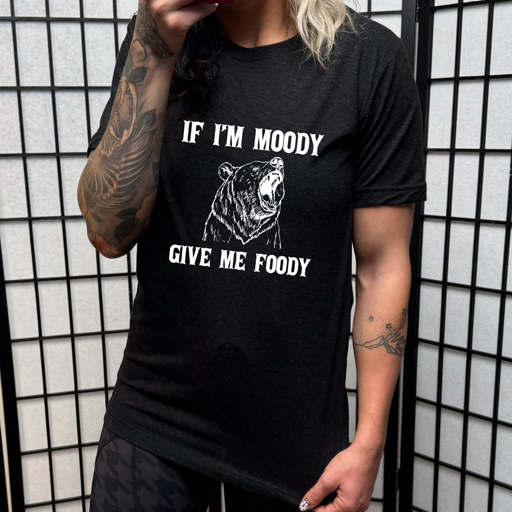 black shirt with the text "If Moody Give Me Foody" on it