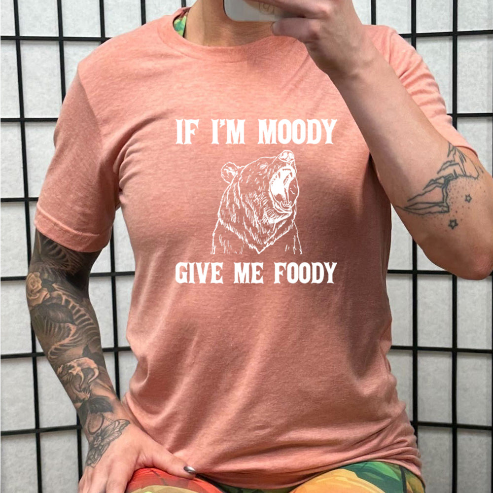 peach shirt with the text "If Moody Give Me Foody" on it