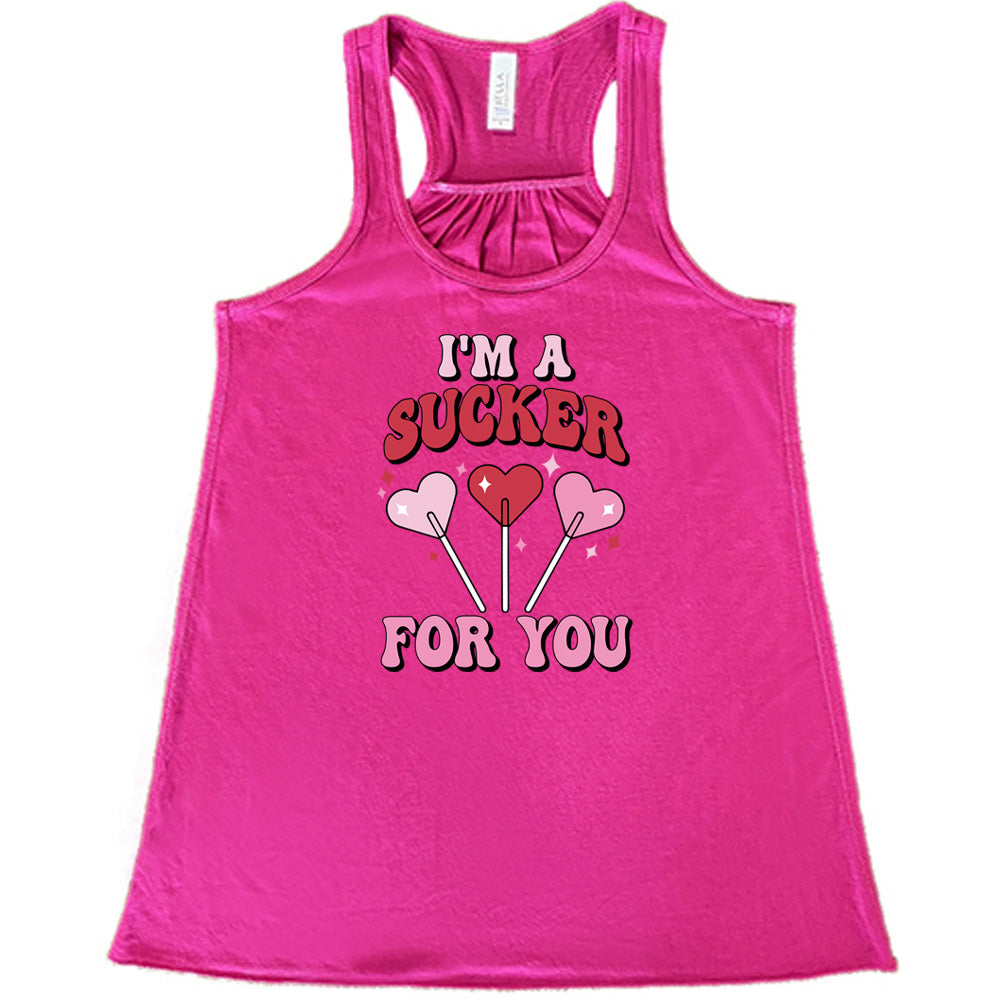 berry shirt with the text "I'm A Sucker For You" on it