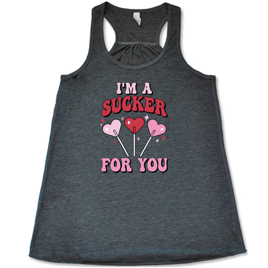 grey shirt with the text "I'm A Sucker For You" on it