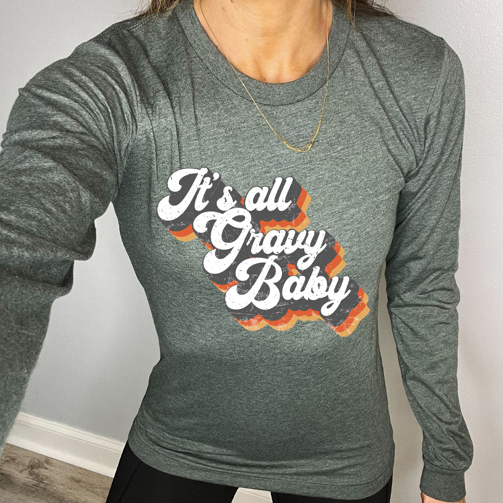 green long sleeve shirt with the text "It's All Gravy Baby" on it