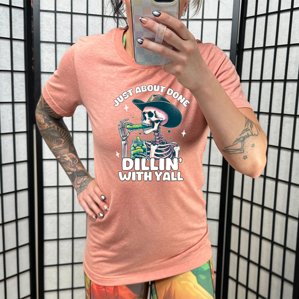 coral shirt with the text "Just About Done Dillin' With Ya'll" on it