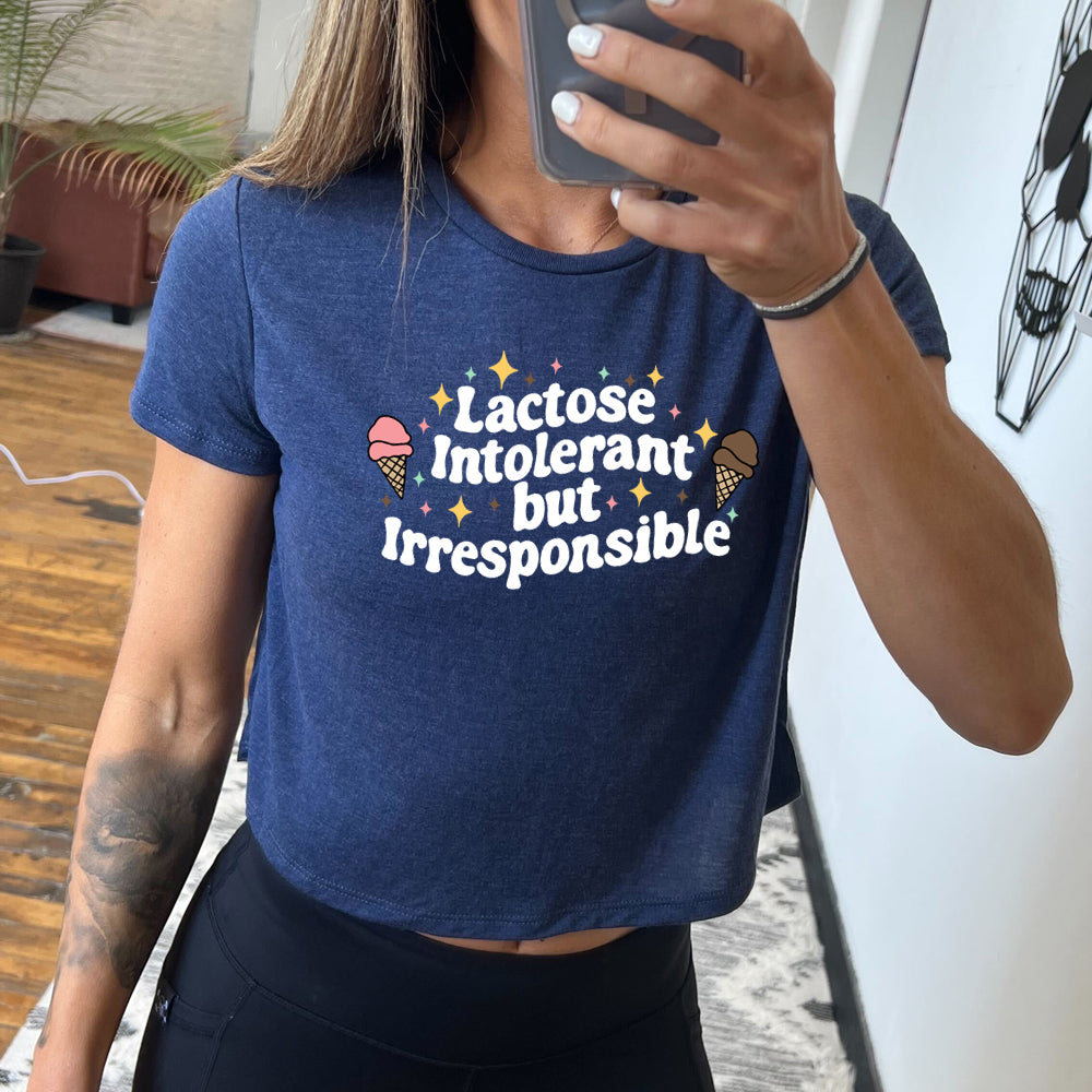 navy blue cropped tee with the text "Lactose Intolerant But Irresponsible" on it