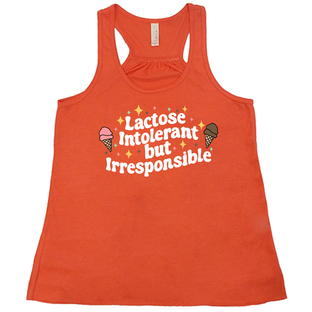 coral cropped tee with the text "Lactose Intolerant But Irresponsible" on it